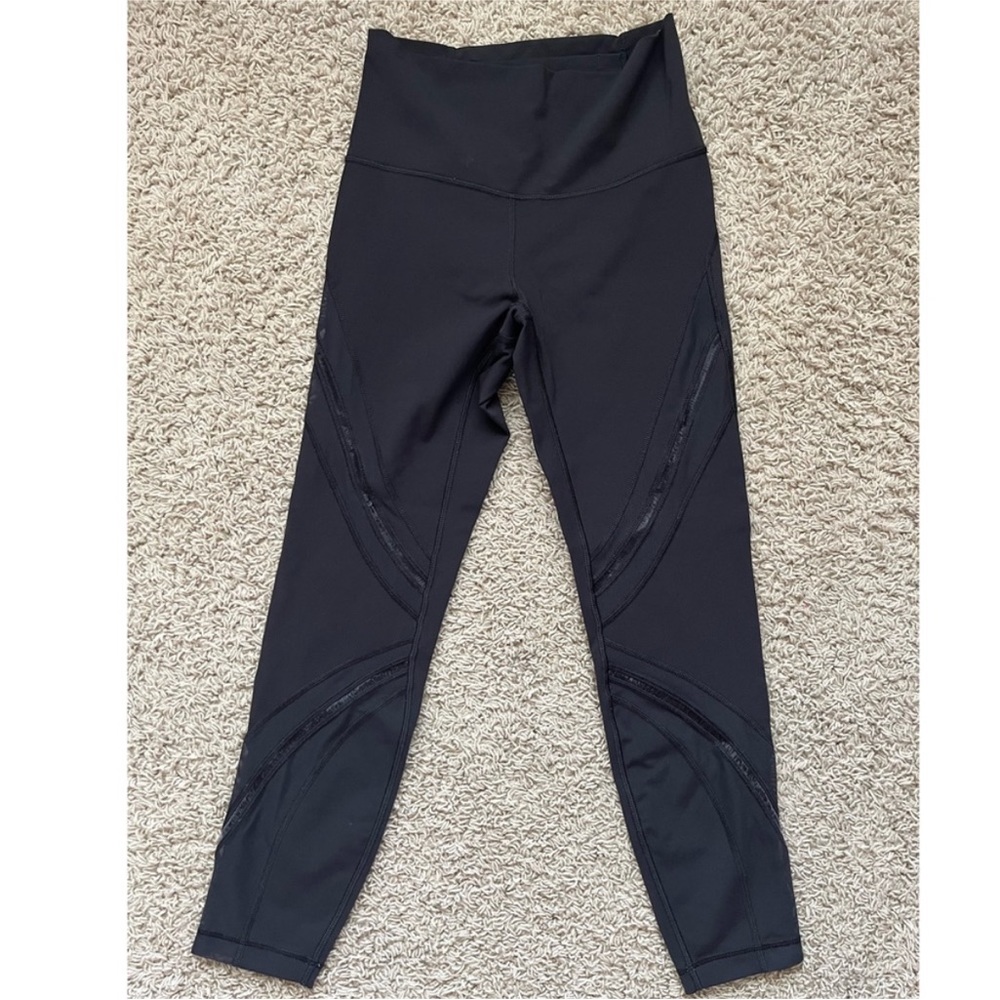 Black leggings 24” inseam with see-through design cuts size 6